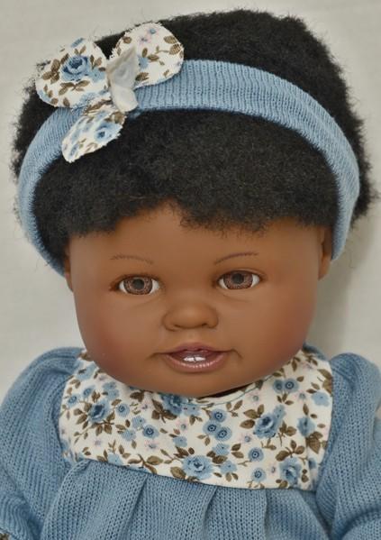 Realistické miminko - holčička - černoška Daniela se zoubky v modrých šatech od firmy Lamagik